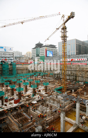Menschen, die beim Bau Website Beijing China Stockfoto