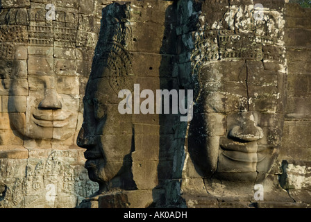 Drei Gesichter der Jayavarman VII in am Nachmittag Licht. Bayon, Angkor Thom, Angkor Wat, Seam Reap, Kambodscha Stockfoto