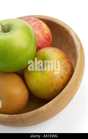 Sammlung von Äpfeln in Holzschale Granny Smith Cox s Orange Pippin Royal Gala und Egremont Russet Stockfoto