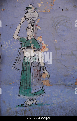 Ein Wandbild von einer Frau in die blaue Stadt Jodhpur, Indien Stockfoto