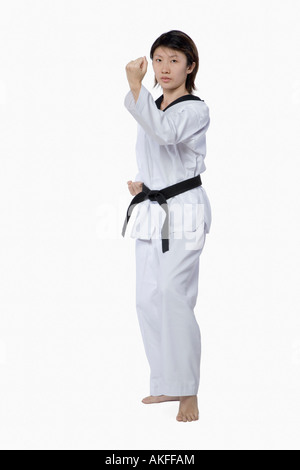 Junge Frau üben karate Stockfoto