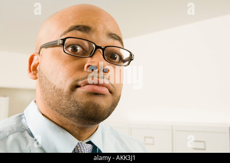 Porträt der Geschäftsmann mit Brille hautnah Stockfoto
