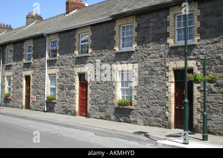 Terrassenförmig angelegten Reihe von viktorianischen Arbeiterhäuser in Greenore, County Louth, Irland Stockfoto