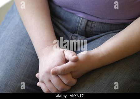 Eine Person, die gefalteten Hände. Stockfoto