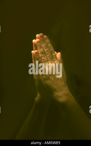 Fotoarchiv der Hände im Gebet Stockfoto