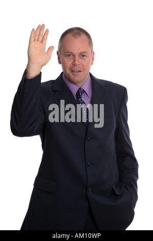 Freundlichen Geschäftsmann winken und sagt Hallo isoliert auf weiss Stockfoto