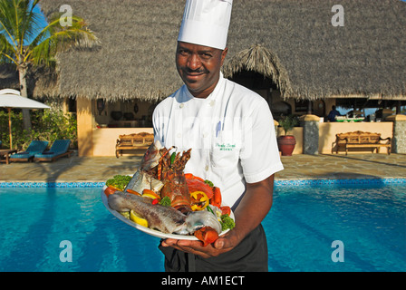 Koch mit Meeresfrüchten am Matemo Island Resort, Quirimbas Inseln, Mosambik, Afrika Stockfoto