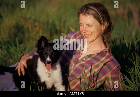 Frau und 12 Wochen alten Border-Collie-Welpen,,,, Victoria, Australien, Horizontal, Stockfoto