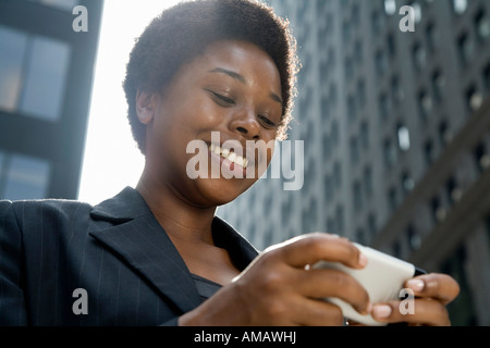 Geschäftsfrau mit PDA Stockfoto