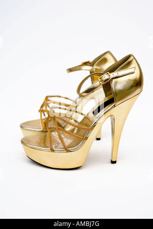 Retro-gold High heels Plateauschuhe Stockfoto