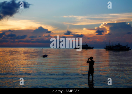 den Sonnenuntergang fotografieren Stockfoto