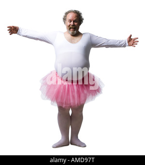 Übergewicht lächelnder Mann in Ballerina tutu Stockfoto
