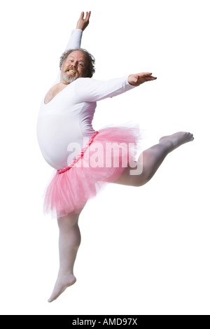 Übergewichtiger Mann in Ballerina Tutu Lächeln und tanzen Stockfoto