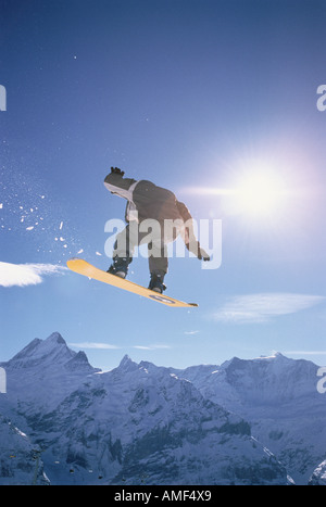 Snowboarder in Air Schweiz Stockfoto