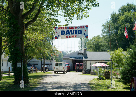 Melden Sie sagen willkommen zu Hause David für das Marine Corps Stockfoto