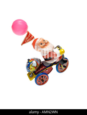 Santa Claus Metall Aufwickeln Spielzeug auf weißem Hintergrund Stockfoto