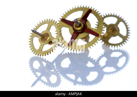 Drei Zahnräder und ihre Reflexion Stockfoto