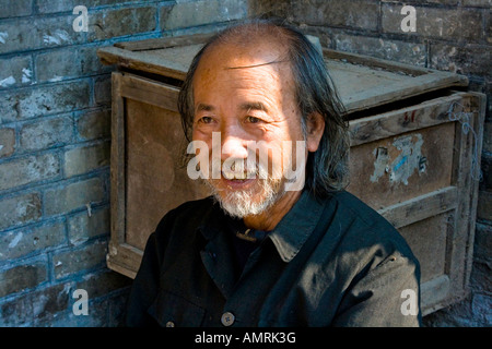 Porträt von einem älteren chinesischen Mann Xiding China Stockfoto