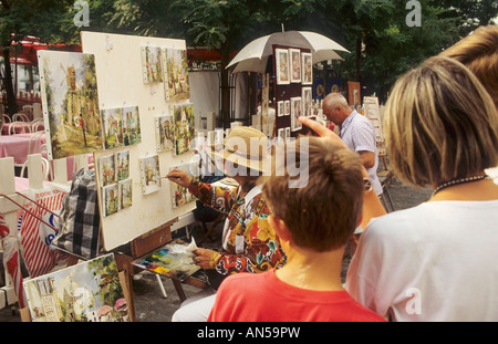 Frankreich Paris Montmartre Place du Tertre Familie beobachten Künstler Stockfoto