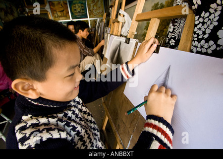 Chinesische junge skizzieren Da Fen Malerei Dorf Shenzhen China Stockfoto