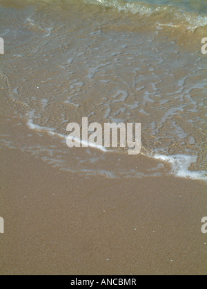 Wellen am Strand Stockfoto