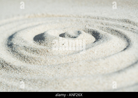 Spiralform gezeichnet in Sand, Nahaufnahme Stockfoto