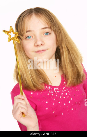 Junge weiße Mädchen mit Stern Zauberstab - würde nicht Butter schmelzen. Stockfoto