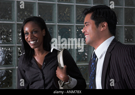 Young Business People. Fokus liegt auf dem Mann. Stockfoto