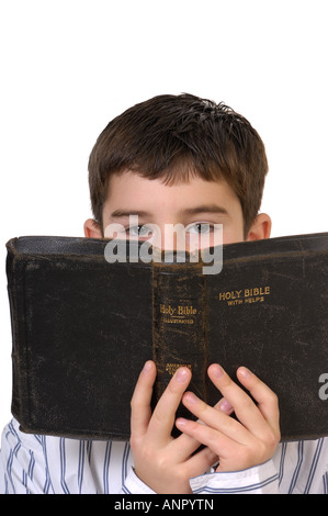 Junge mit Bibel Stockfoto