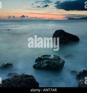 Sonnenuntergang am Strand Stockfoto