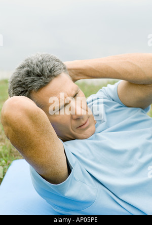Mann Sit Stockfoto