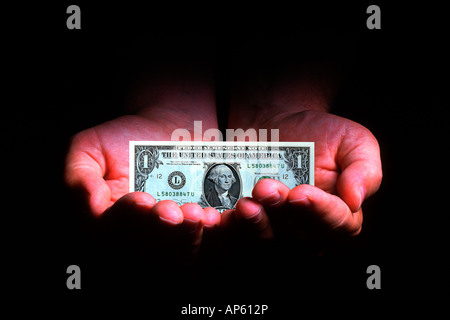 Zwei Hände mit einem Dollarschein, digital composite Stockfoto