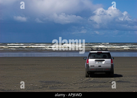 Auto am Strand Stockfoto