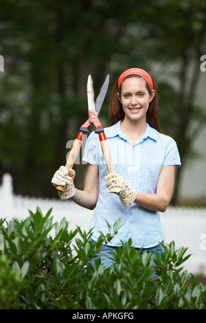 Gärtner mit Heckenscheren Stockfoto
