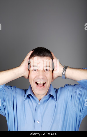 Studio-Porträt eines Mannes, Ausdrücke Stockfoto