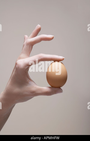 Woman's Hand Ei (close-up) Stockfoto