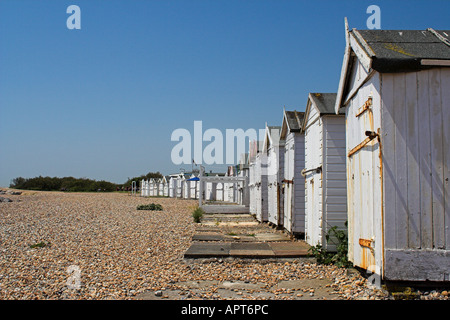 Strandhütten auf Goring Meer Strand Stockfoto