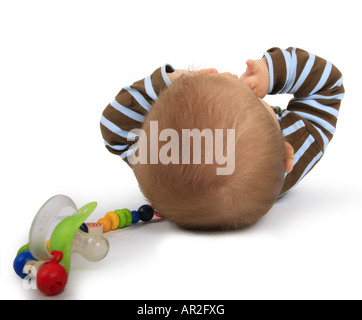 gebundenen Baby mit Schnuller Keeper auf dem Rücken liegend Stockfoto