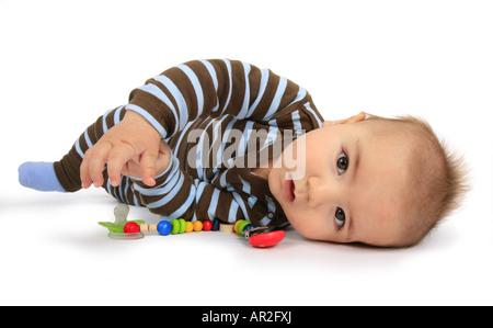 Baby mit Schnuller Keeper auf der Seite liegend Stockfoto