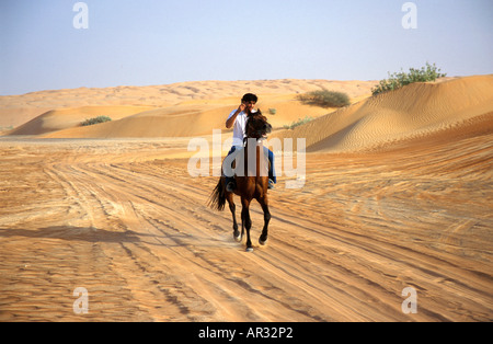 Reiten, Wüste in der Nähe von Sur, Sultanat Oman Stockfoto