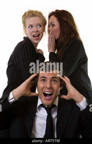 Hinter deinem Rücken reden Stockfoto