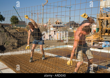 Gebäude-Arbeiter bei der Arbeit auf einer Baustelle Stockfoto