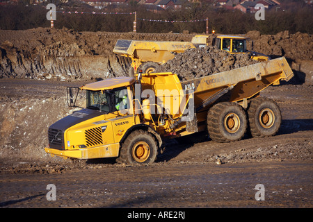 Pflanze-Baumaschinen in Aktion in Suffolk Stockfoto