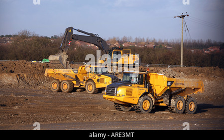 Pflanze-Baumaschinen in Aktion in Suffolk Stockfoto