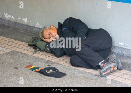 Obdachlose Bettler in Hong Kong Stockfoto