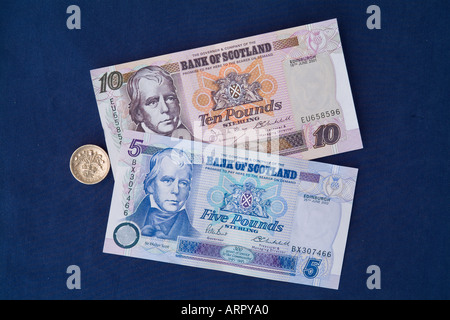 dh Bank of Scotland Cash MONEY SCOTLAND UK Scottish Five Zehn Pfund-Noten ein Pfund Sterling Distel Münze Papier Währung Banknoten Stockfoto