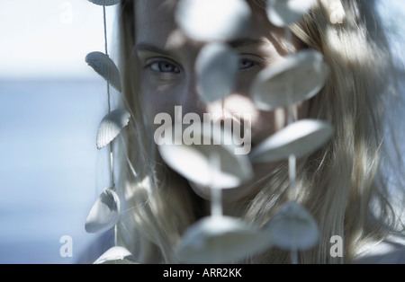 Young Woman Portrait mit Muscheln Stockfoto