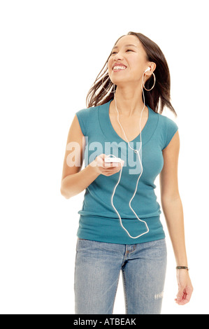 Young Woman Listening to mp3 Player Stockfoto