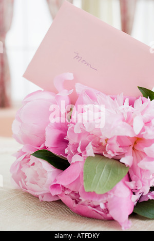 Blumen und Mütter-Tageskarte Stockfoto