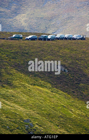 Allrad-Fahrzeuge, die Zugehörigkeit zu einer Jagdgesellschaft auf Grouse moor Stockfoto